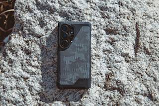 UAG Metropolis LT Galaxy S26 Ultra Case Galaxy S26 Ultra in Micro Hex Camo Graphite lifestyle view