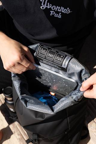 UAG 18L Rolltop Backpack with DRYOUT® Active Moisture-Removal Technology™ Backpacks case in Black lifestyle view