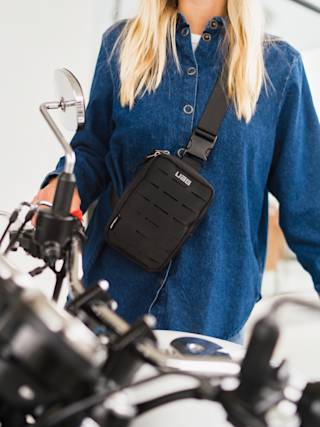 UAG Tech Crossbody Sling with DRYOUT® Active Moisture-Removal Technology™ Cross Body Bags case in Black lifestyle view