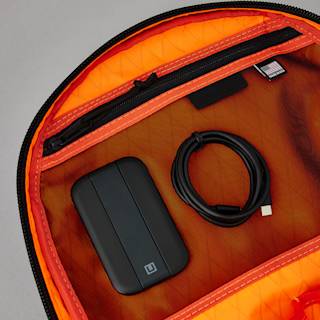 UAG The Brown Buffalo x UAG 21-Liter Back Pack Backpacks case in Black/Orange detail view