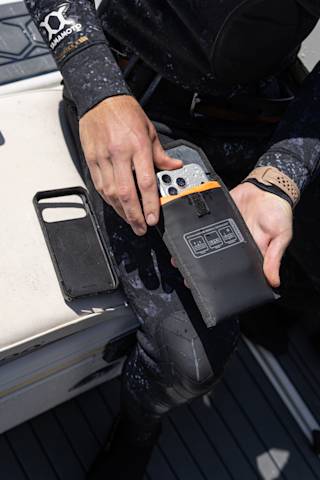 UAG Phone Recovery Pouch made with DRYOUT® Active Moisture-Removal Technology™ Backpacks case in Black lifestyle view