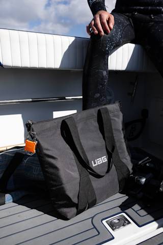 UAG Tech Tote with DRYOUT® Active Moisture-Removal Technology™ Backpacks case in Black lifestyle view