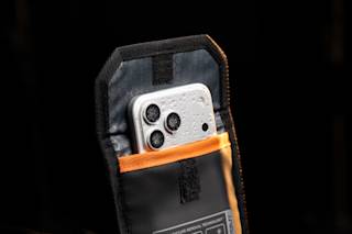 UAG Phone Recovery Pouch made with DRYOUT® Active Moisture-Removal Technology™ Backpacks case in Black lifestyle view