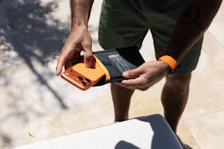 UAG Phone Recovery Pouch made with DRYOUT® Active Moisture-Removal Technology™ Backpacks case in Black lifestyle view
