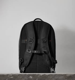 UAG The Brown Buffalo x UAG 21-Liter Back Pack Backpacks case in Black/Orange lifestyle view