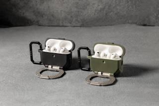 UAG Monarch Case for AirPods Pro (3rd Gen, 2025) AirPods Pro (3rd Gen) in Black/Silver lifestyle view