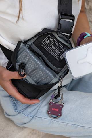 UAG Tech Crossbody Sling with DRYOUT® Active Moisture-Removal Technology™ $72.45 case lifestyle view