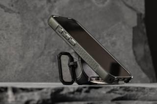 UAG Monarch Case for AirPods Pro (3rd Gen, 2025) AirPods Pro (3rd Gen) in Black/Silver lifestyle view