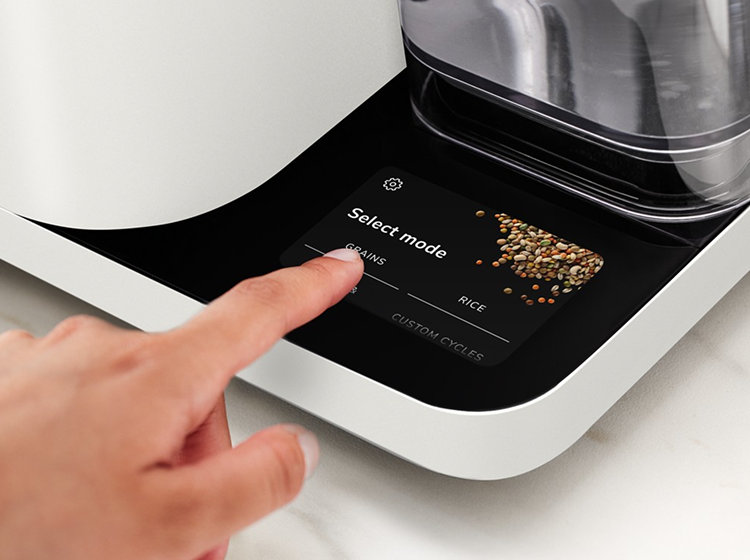 A person interacting with the intuitive controls, selecting a grain preset.