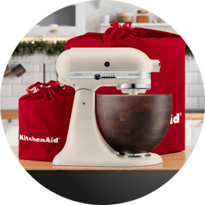 A KitchenAid® stand mixer and red gift bag