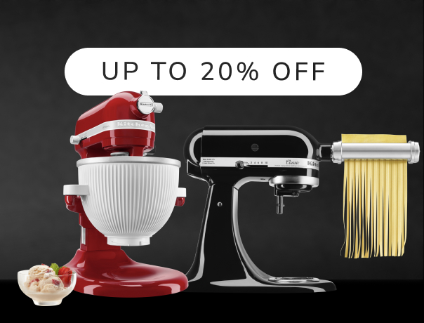 Two KitchenAid® stand mixers with a bowl of ice cream and pasta press attachment