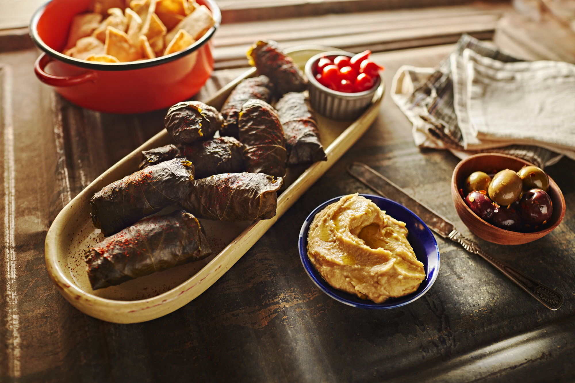 o2SUtj46TdmMLkJCET0r_grape-leaves_96z.png