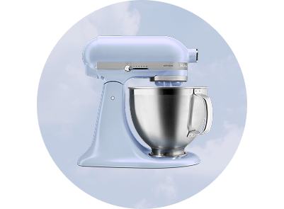 A Blue Salt stand mixer on a light blue background with clouds.