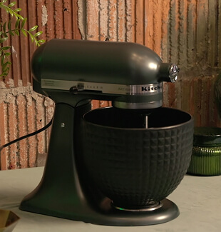 A pink KitchenAid® stand mixer with a stainless steel bowl