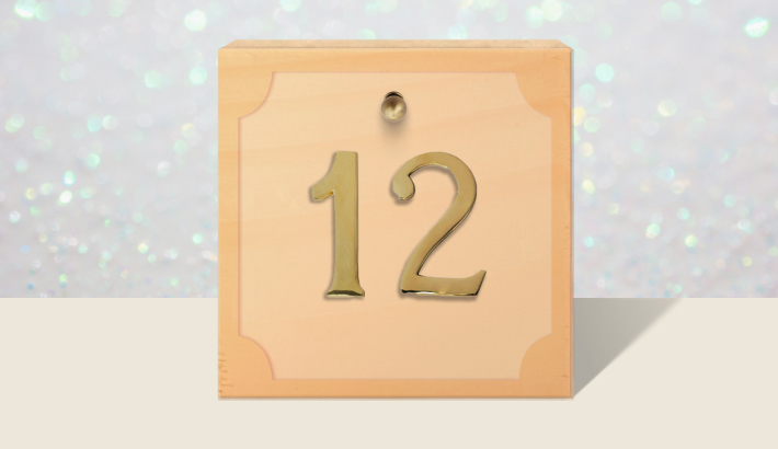 A closed brown gift box with #12