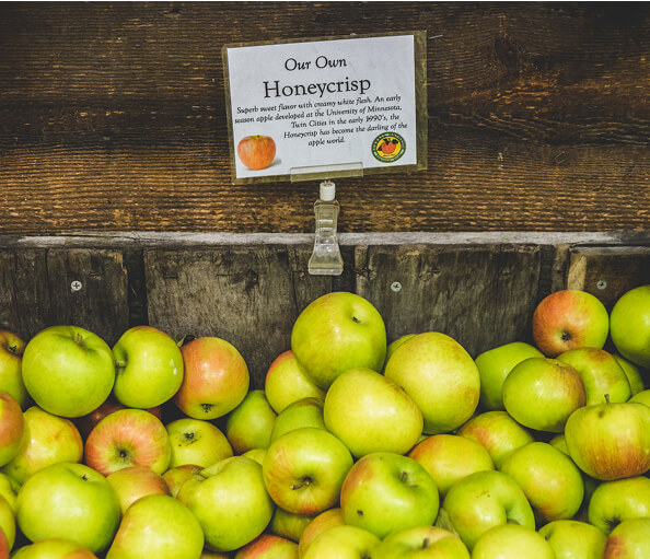Green apples in a display