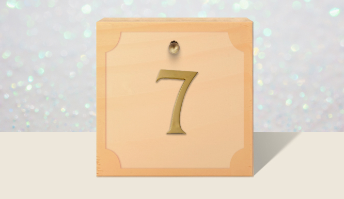 A closed brown gift box with #7