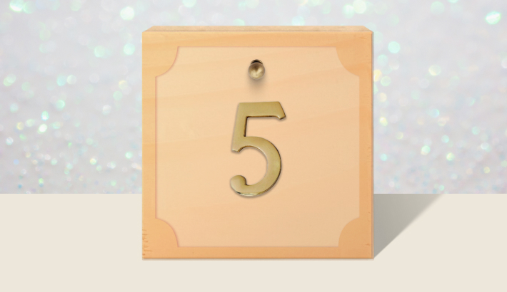 A closed brown gift box with #5