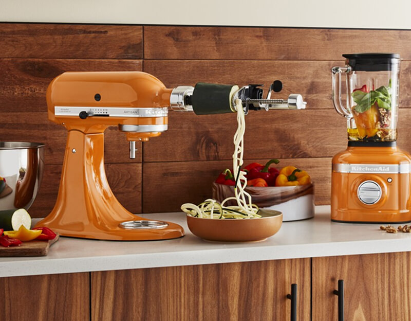 A KitchenAid® Stand Mixer and Countertop Blender in Honey.