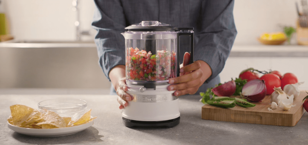 preparing-salsa-in-white-food-chopper