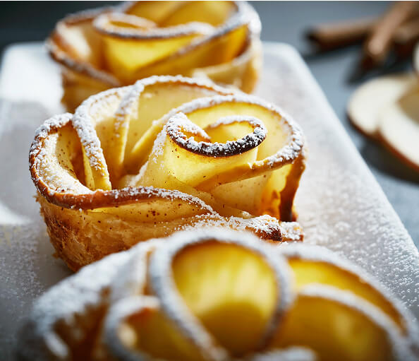 Powdered pastries on a plate