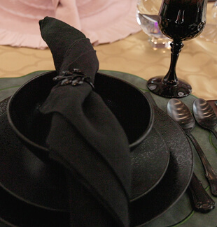 A person pouring hot water into a mug