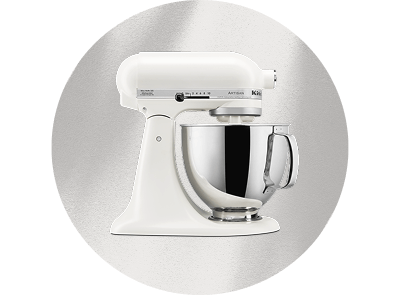 A Porcelain White stand mixer on a white patterned background.