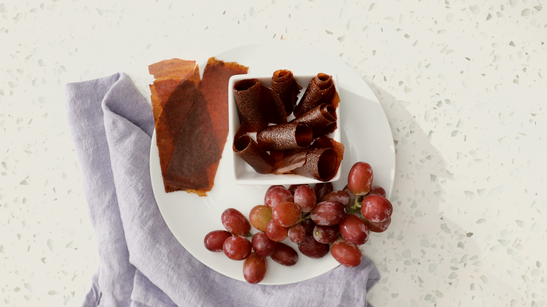 F4uAczCfRcuCwA7eot5l_Hero_Oven_Grape_Fruit_Leather.00_01_00_22.Still001.png