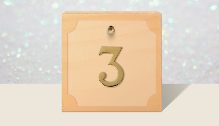 A closed brown gift box with #3