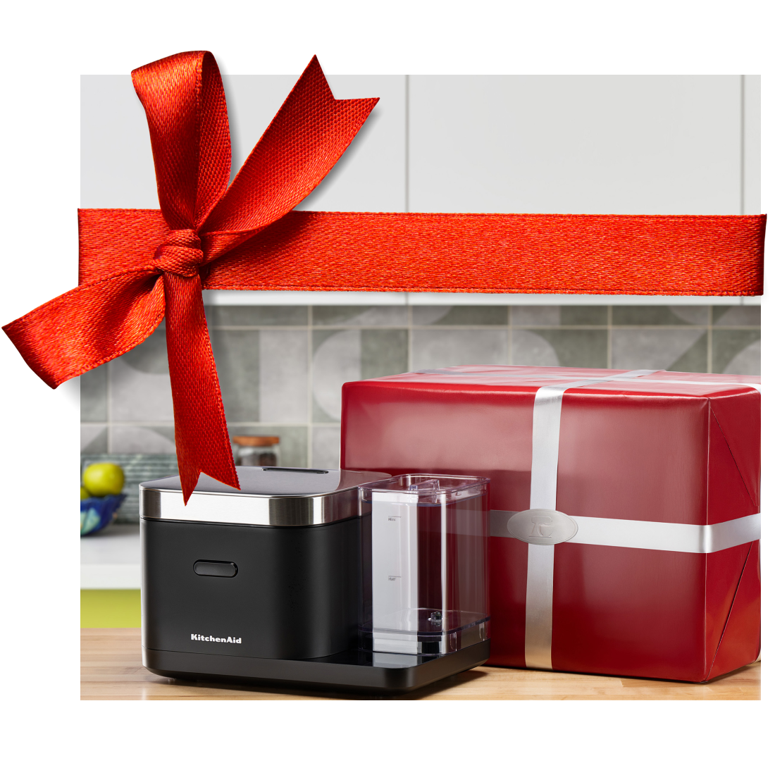 A KitchenAid® grain and rice maker and red gift box