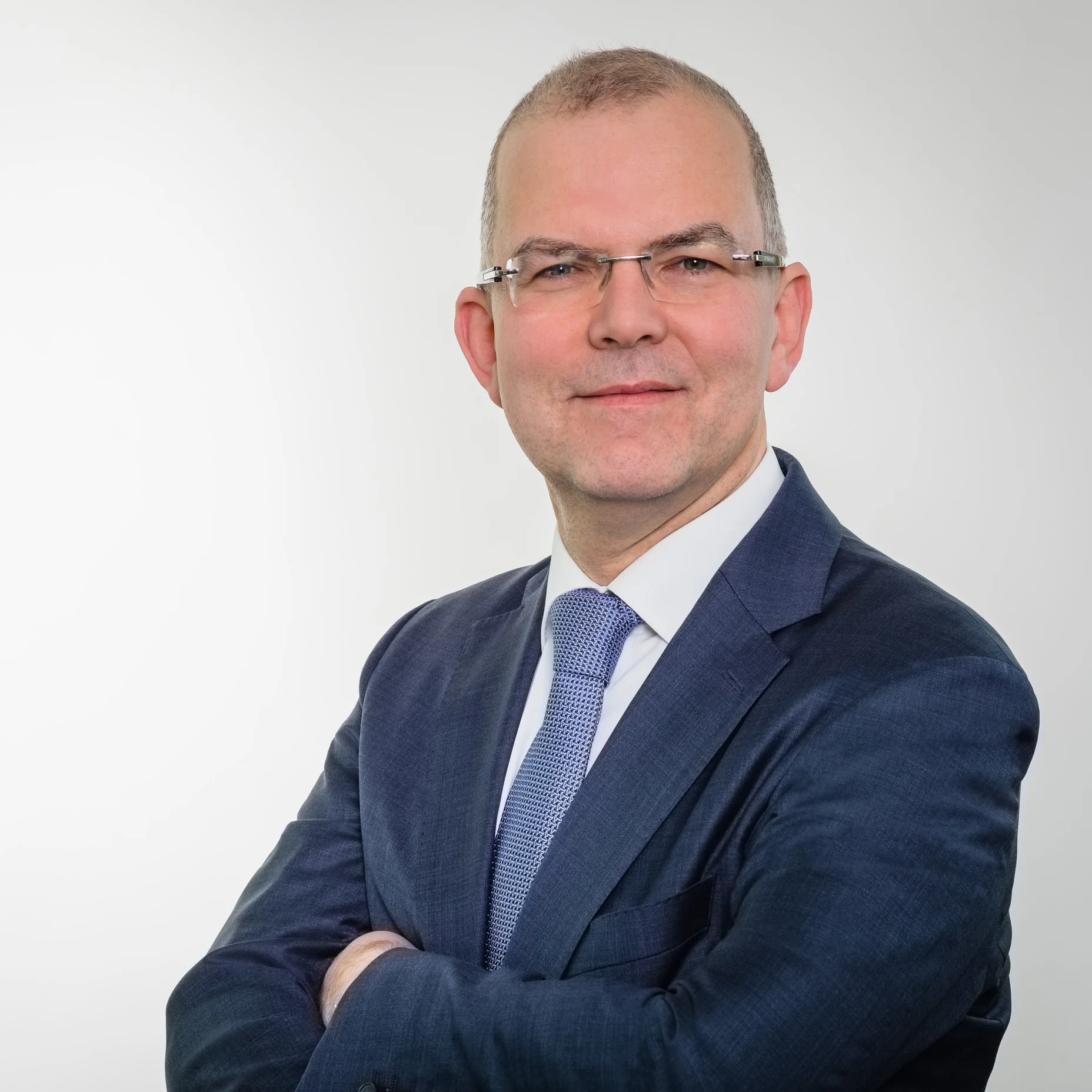 Portrait von Jörg Naumer, Leiter Kapitalmarktanalyse bei Allianz Global Investors.