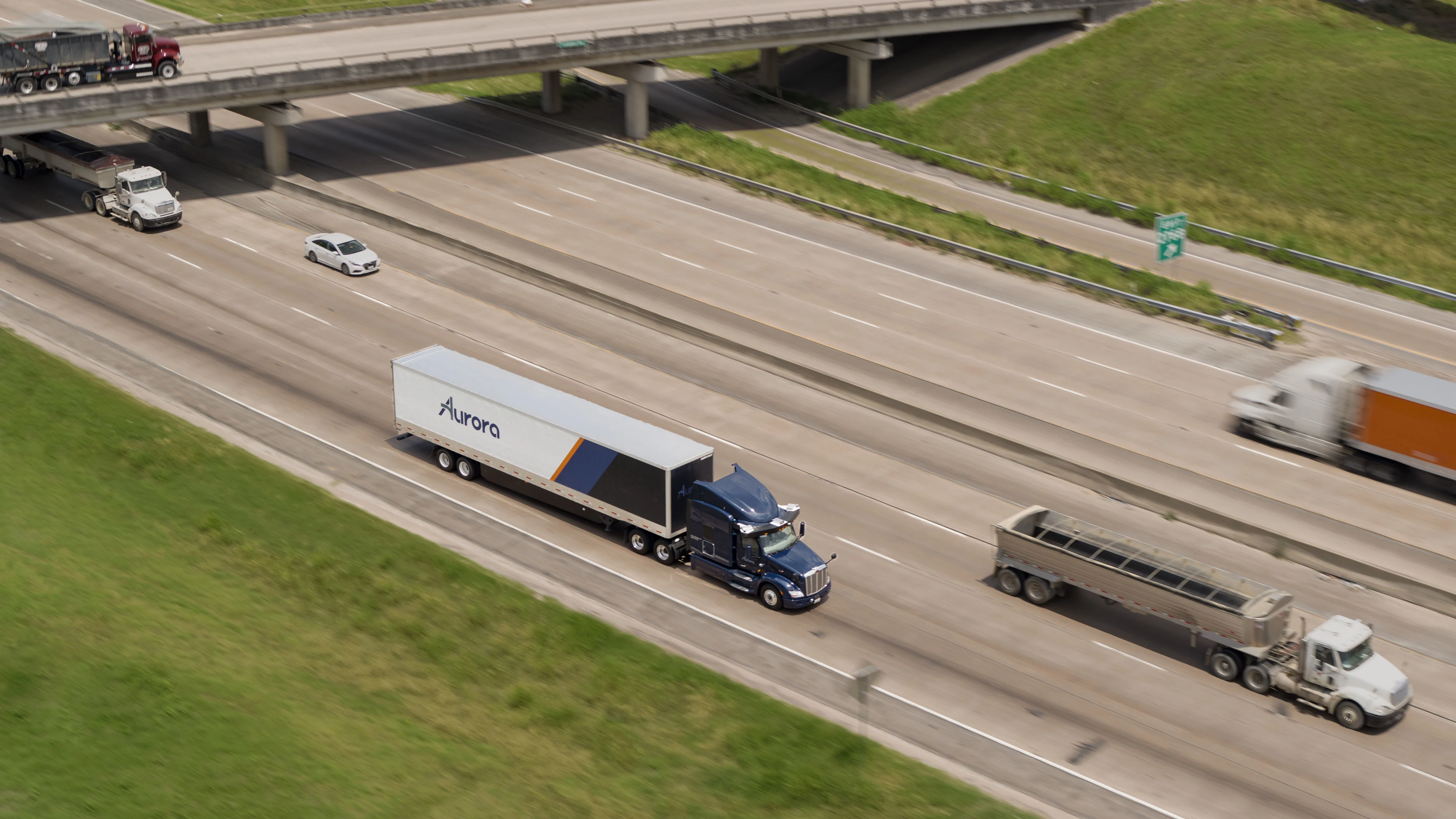 86cbdebd-d247-4f46-b842-a7f63e54f499_Aurora+Driving+Trucking.jpg