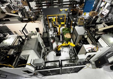 “You simply can’t talk about the advances in automation and machining without talking about them together, and IMTS is where everyone comes together,” says Scott Harms, president of MetalQuest Unlimited. The company’s newest automated production cell features three Okuma vertical machining centers, three FANUC robots, and a FANUC vision system.