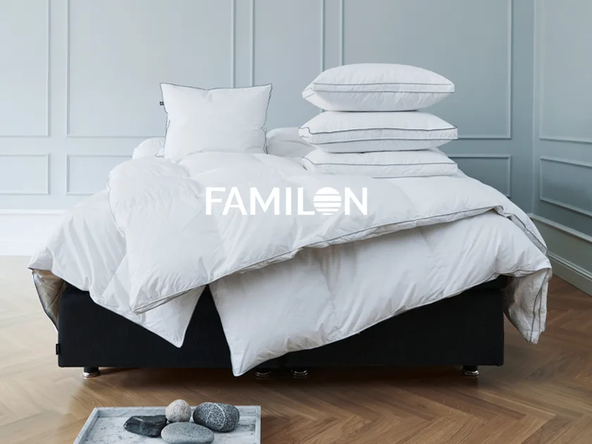 Sänky Familon-logolla