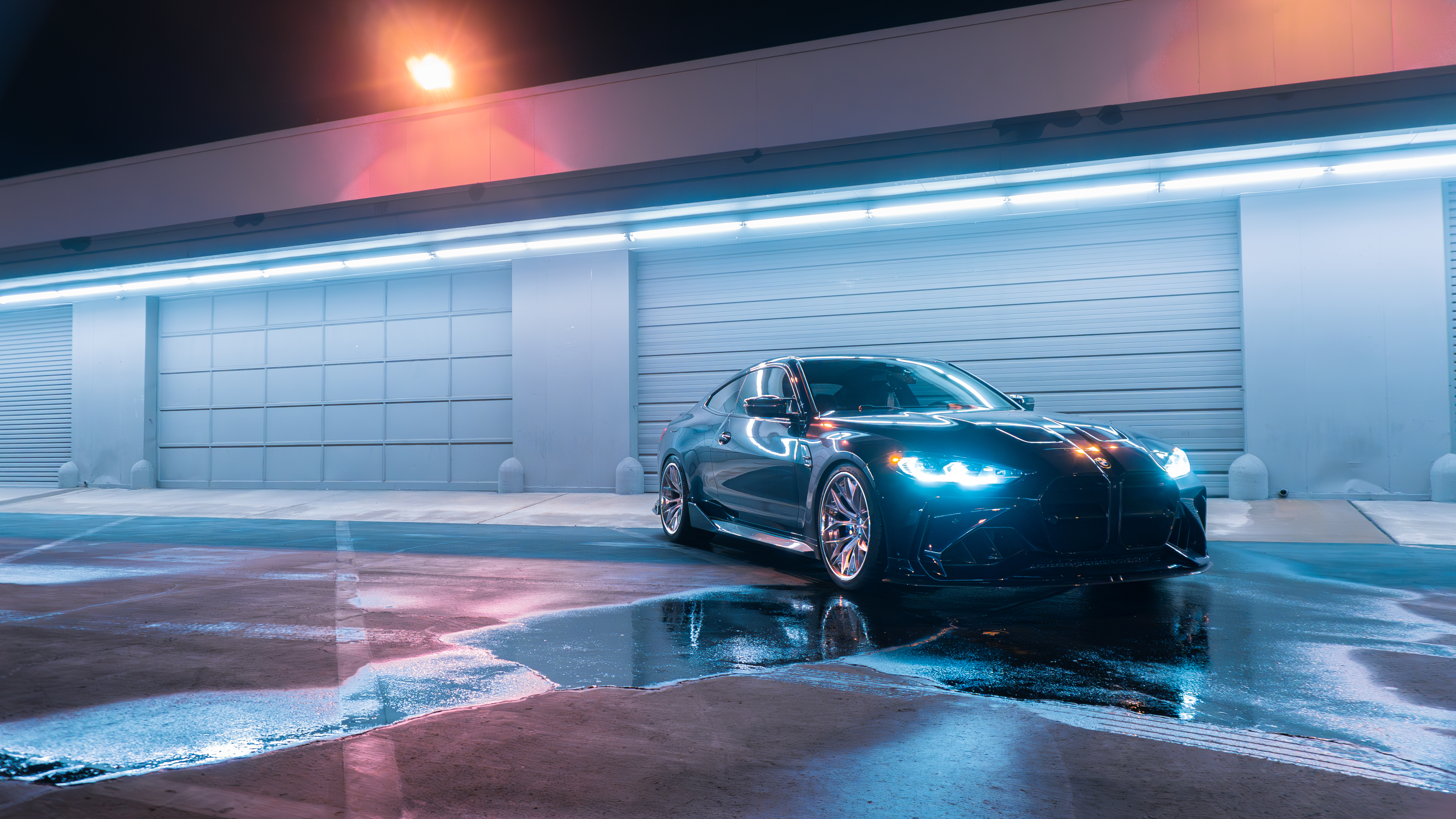 BMW M4 with Motivo Forged CS-J custom wheels in gloss brushed clear face and triple chrome lip front corner view
