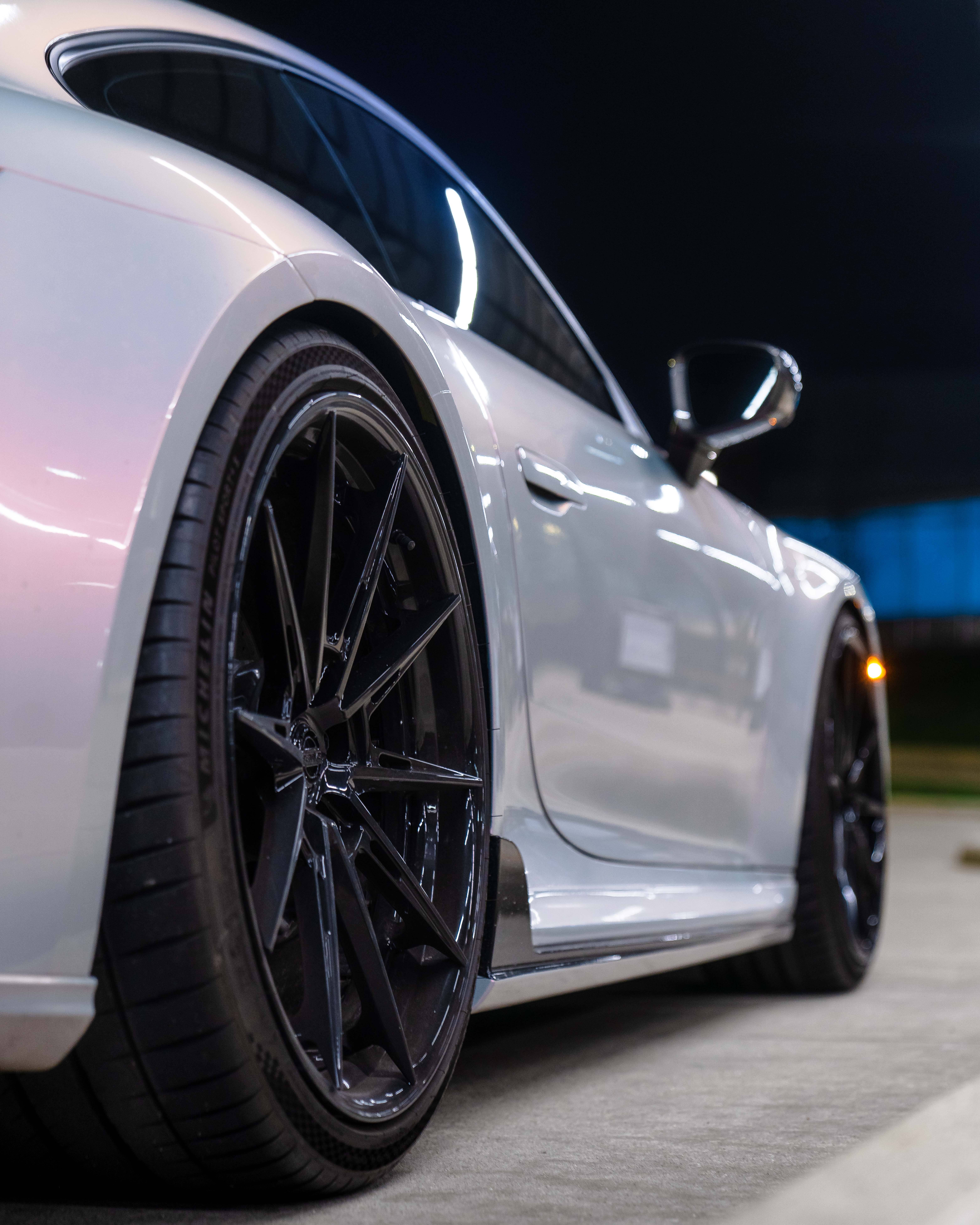 992 Porsche 911 Carrera T with Motivo Forged CS-L custom wheels in gloss black rear corner side view
