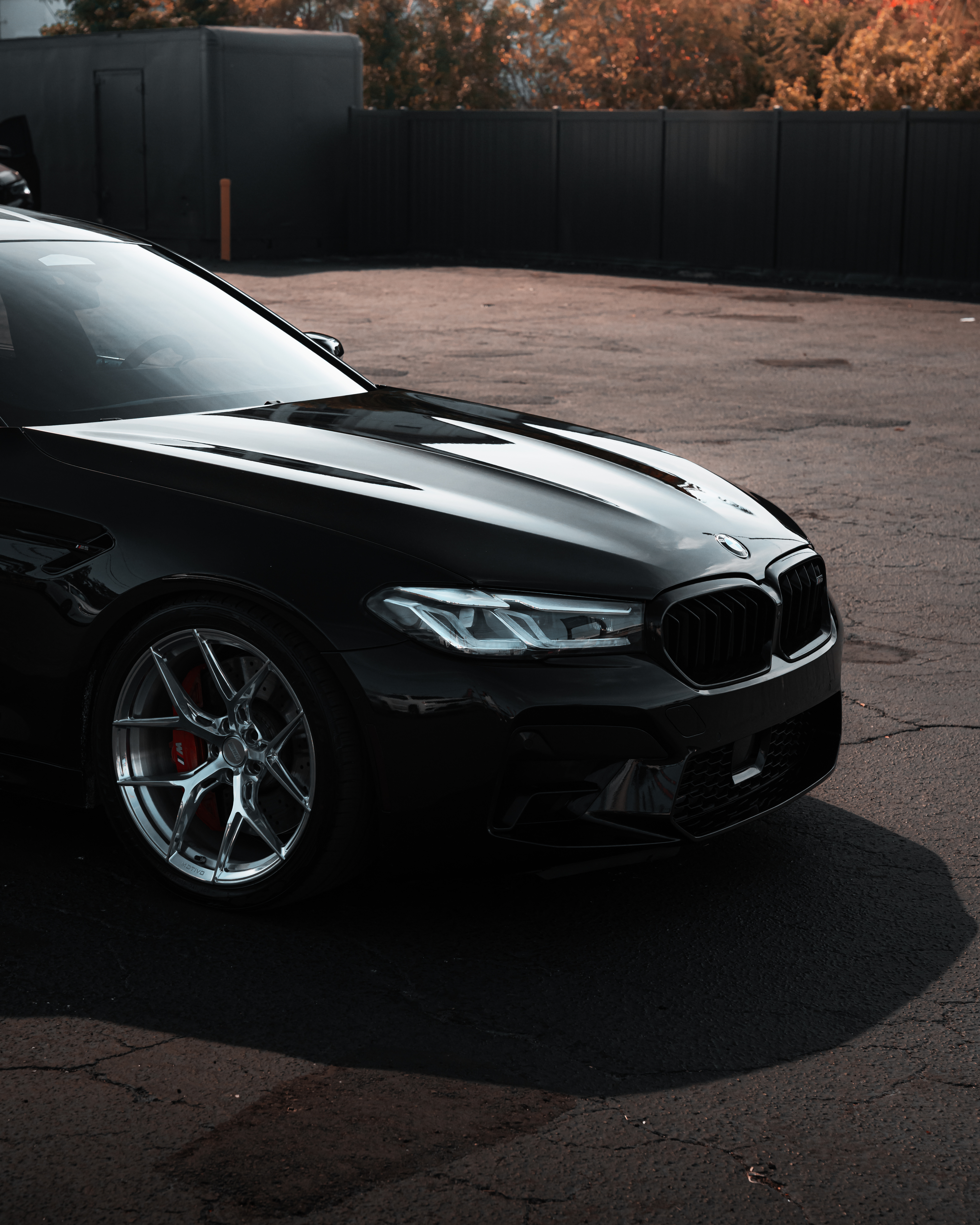 F90 BMW M5 LCI with Motivo Forged MB-H custom wheels in gloss polished clear finish front corner view