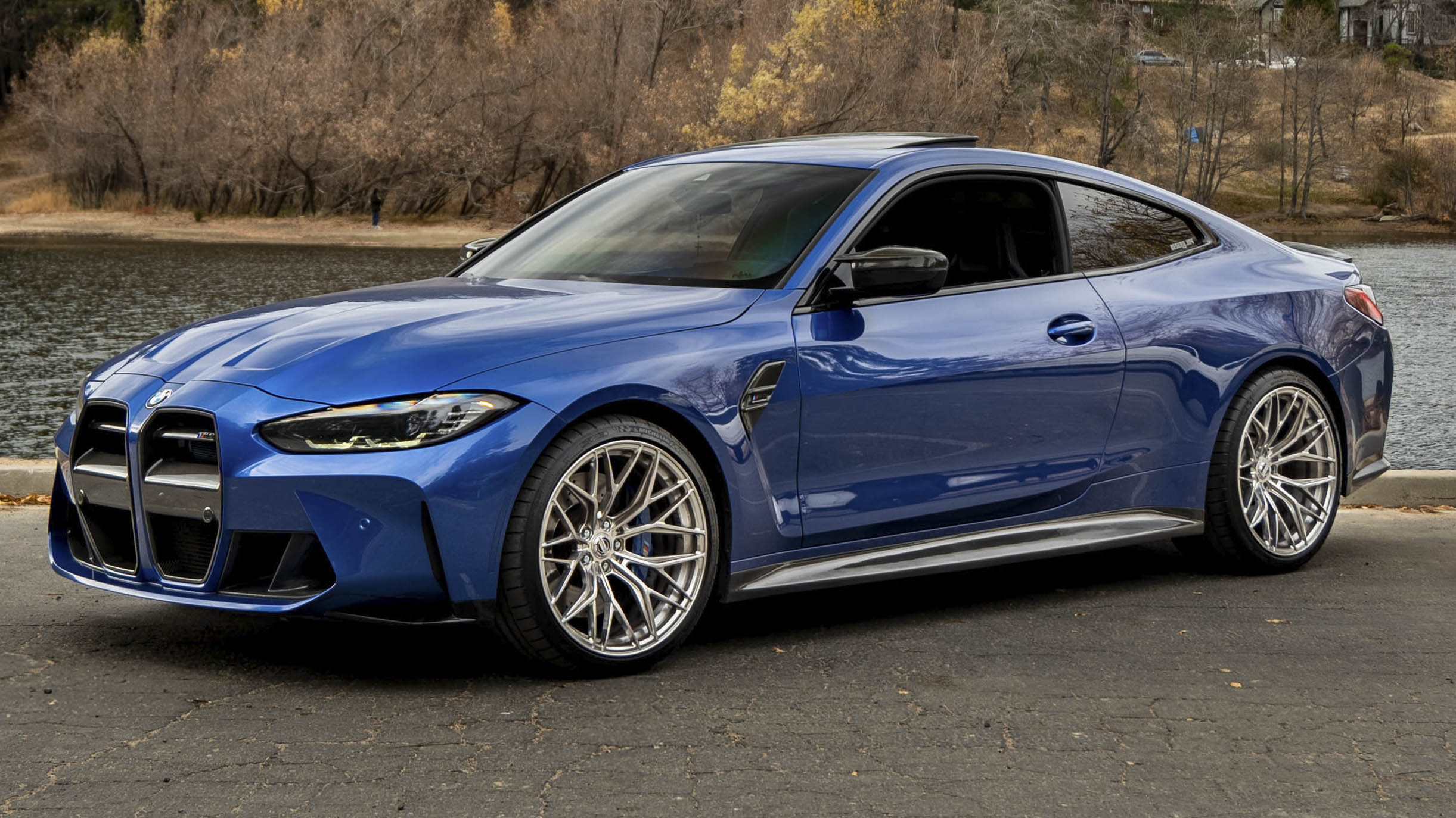 G82 BMW M4 with Motivo Forged MB-E custom wheels in gloss polished clear finish front side view