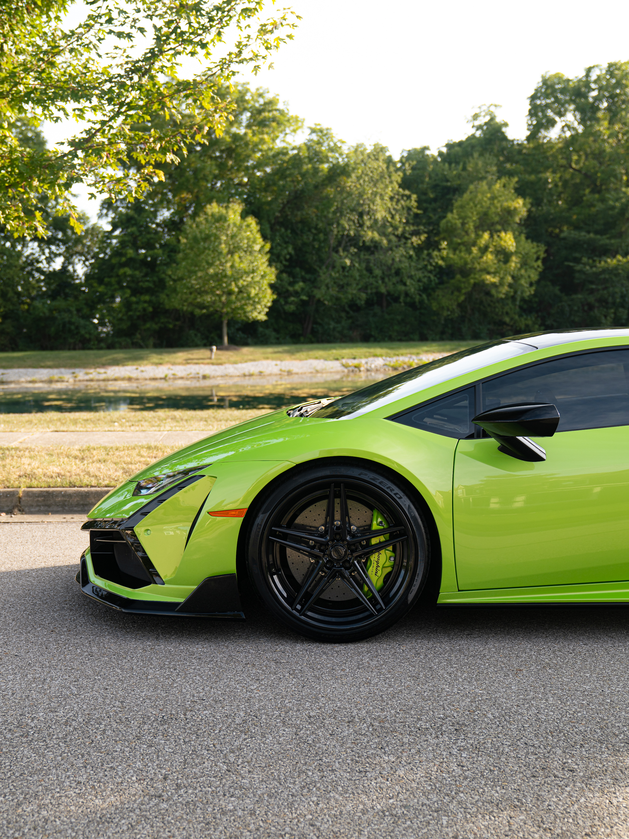 Lamborghini Huracan with Motivo Forged CS-D custom wheels in gloss black face and gloss black lip side front view