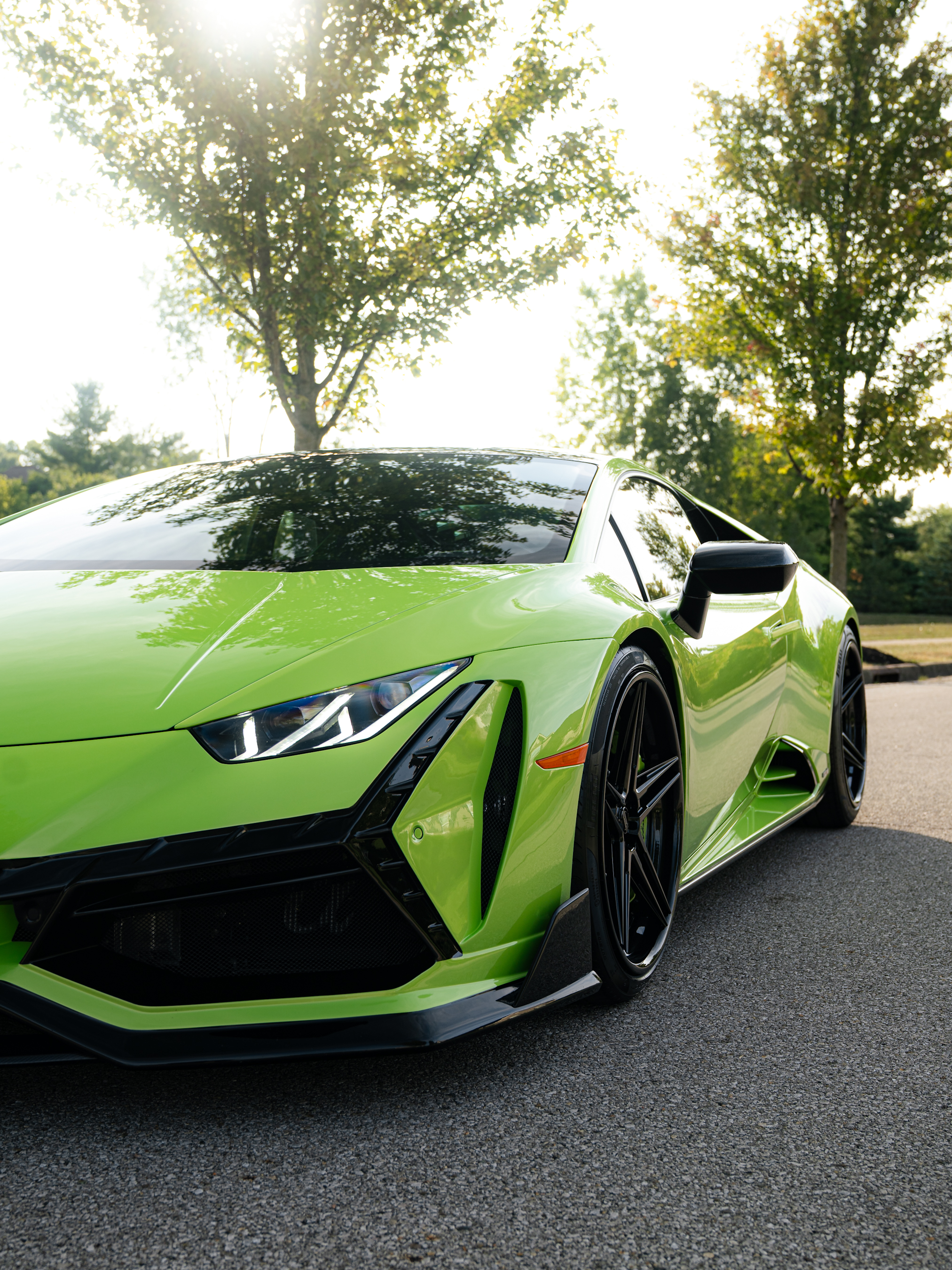 Lamborghini Huracan with Motivo Forged CS-D custom wheels in gloss black face and gloss black lip front corner view