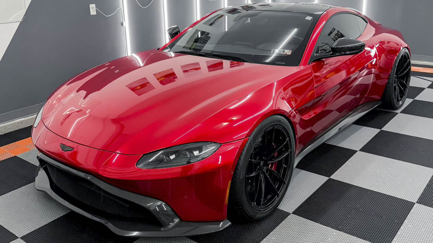 Aston Martin Vantage with Motivo Forged MB-D custom wheels in gloss black finish front side view