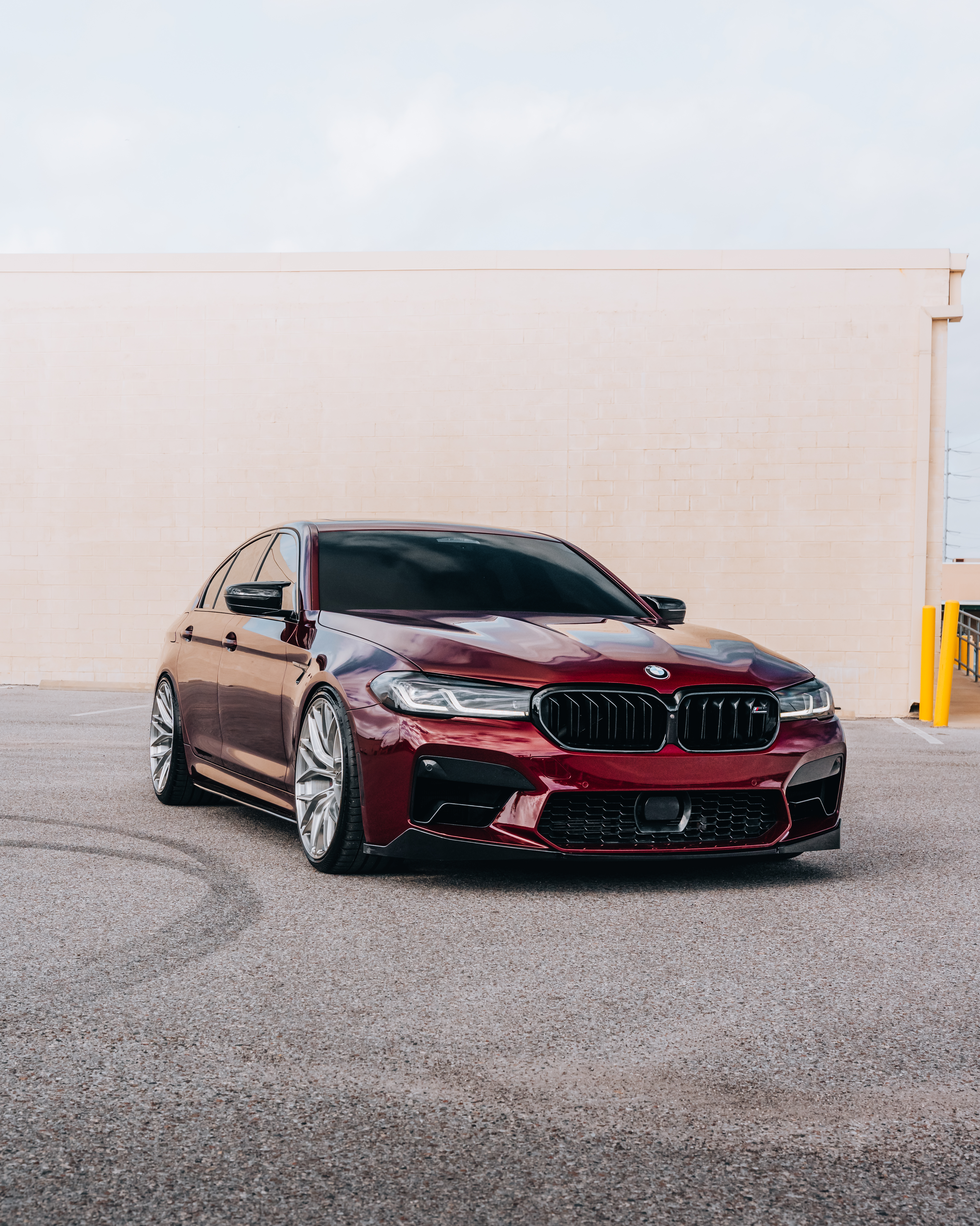 F90 BMW M5 LCI with Motivo Forged MB-E custom wheels in gloss brushed clear finish front side view