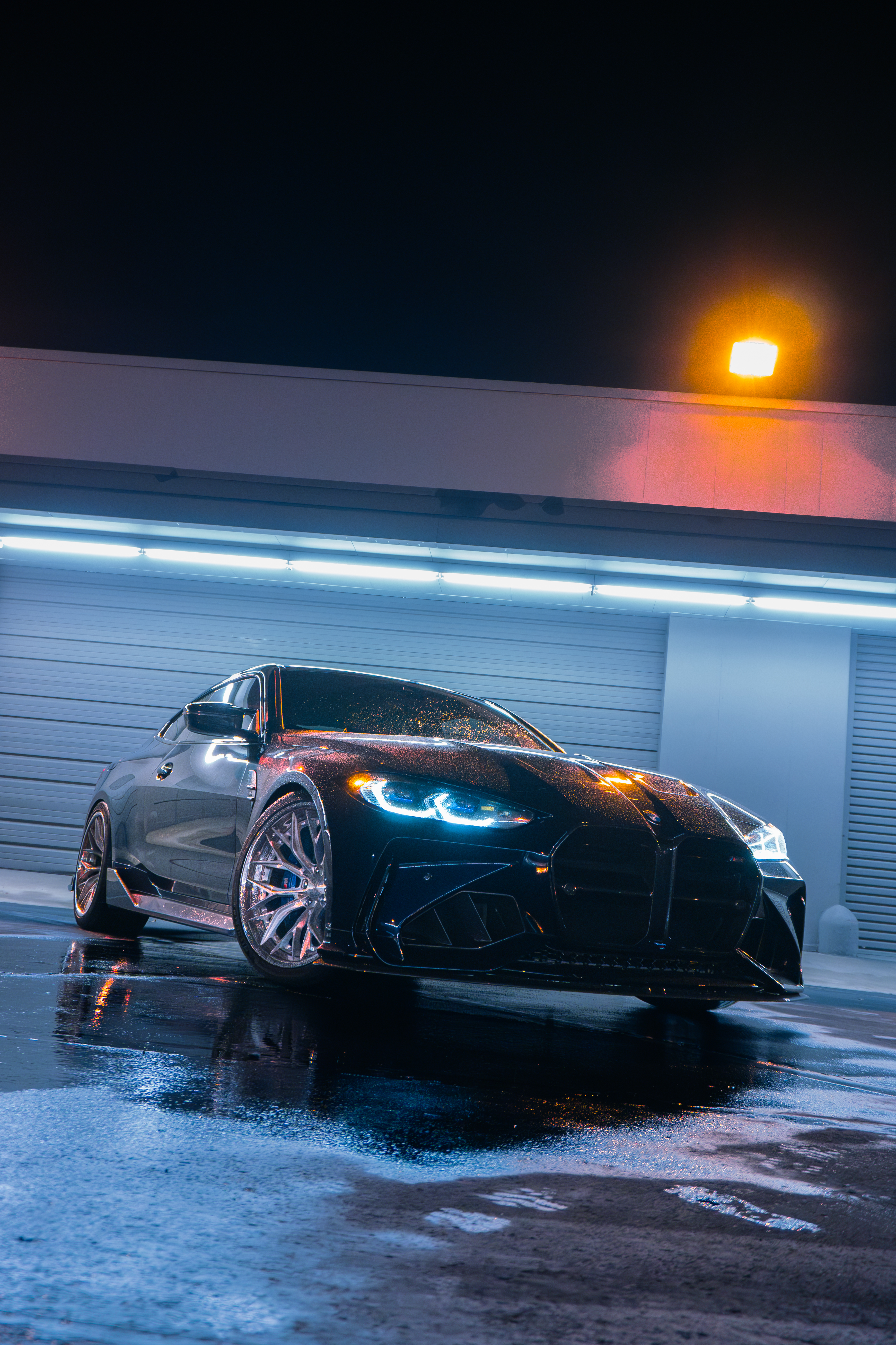 BMW M4 with Motivo Forged CS-J custom wheels in gloss brushed clear face and triple chrome lip front corner side view