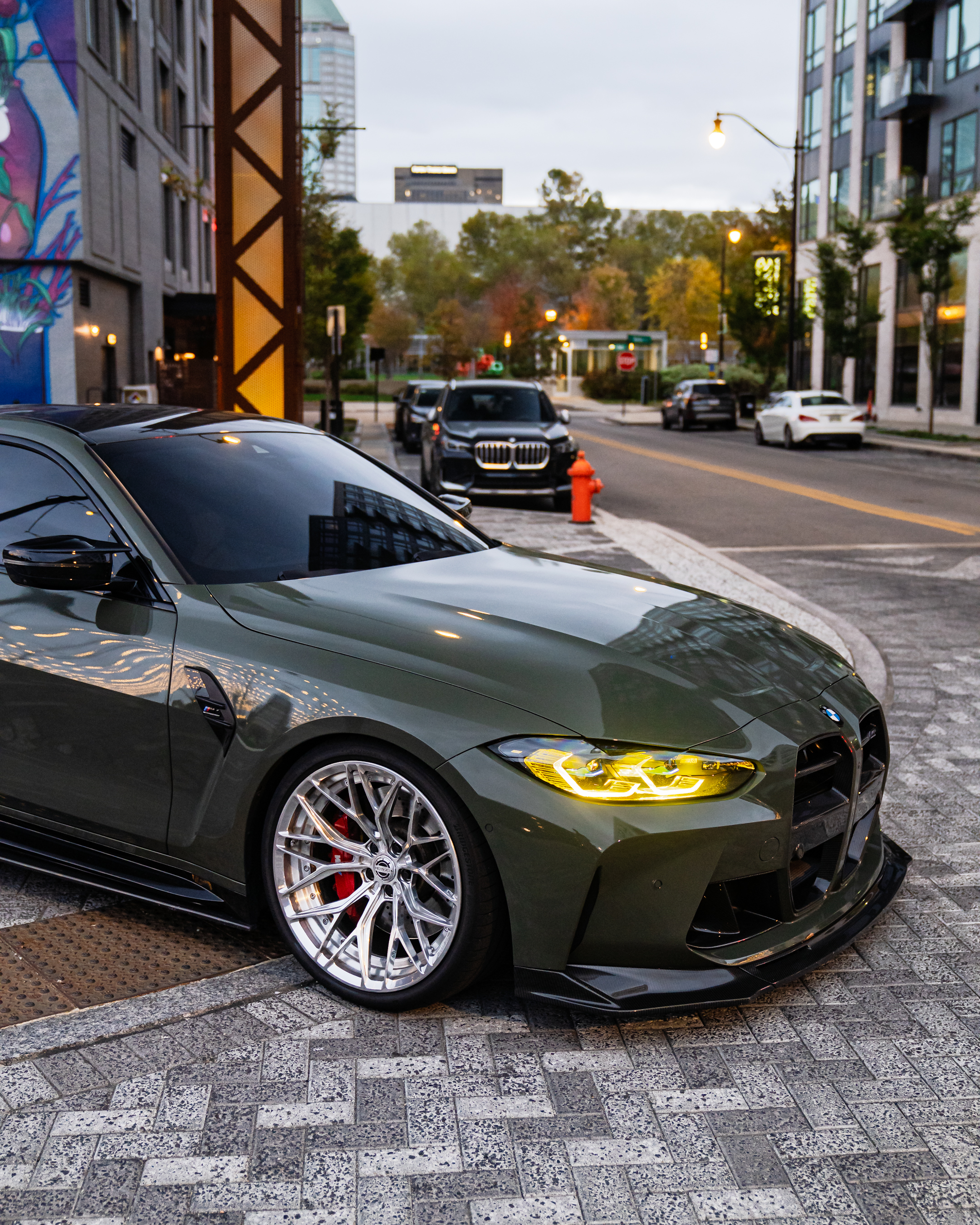 BMW M4 with Motivo Forged CS-C custom wheels in gloss polished clear face and brushed clear barrel front half view