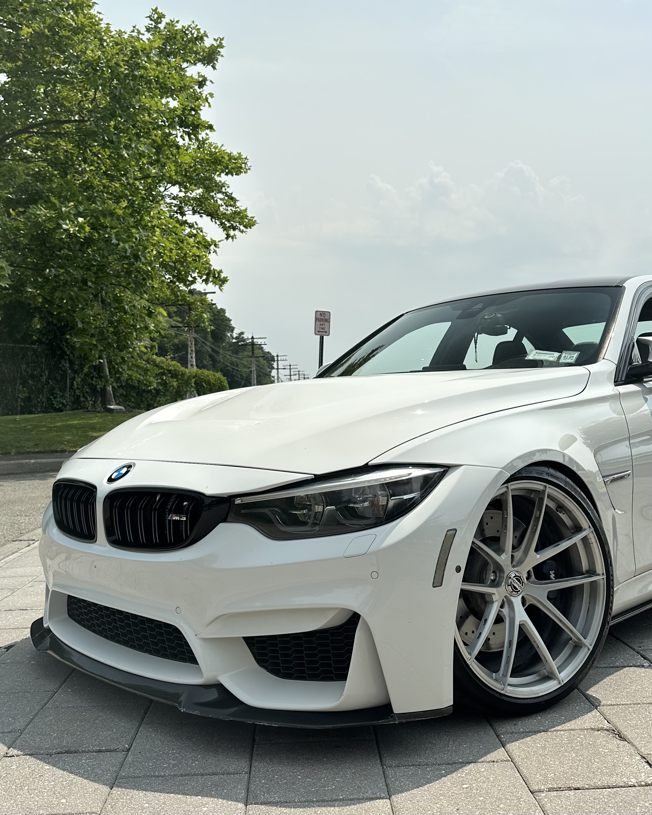 F80 BMW M3 with Motivo Forged MB-K custom wheels in gloss brushed clear finish front half side view