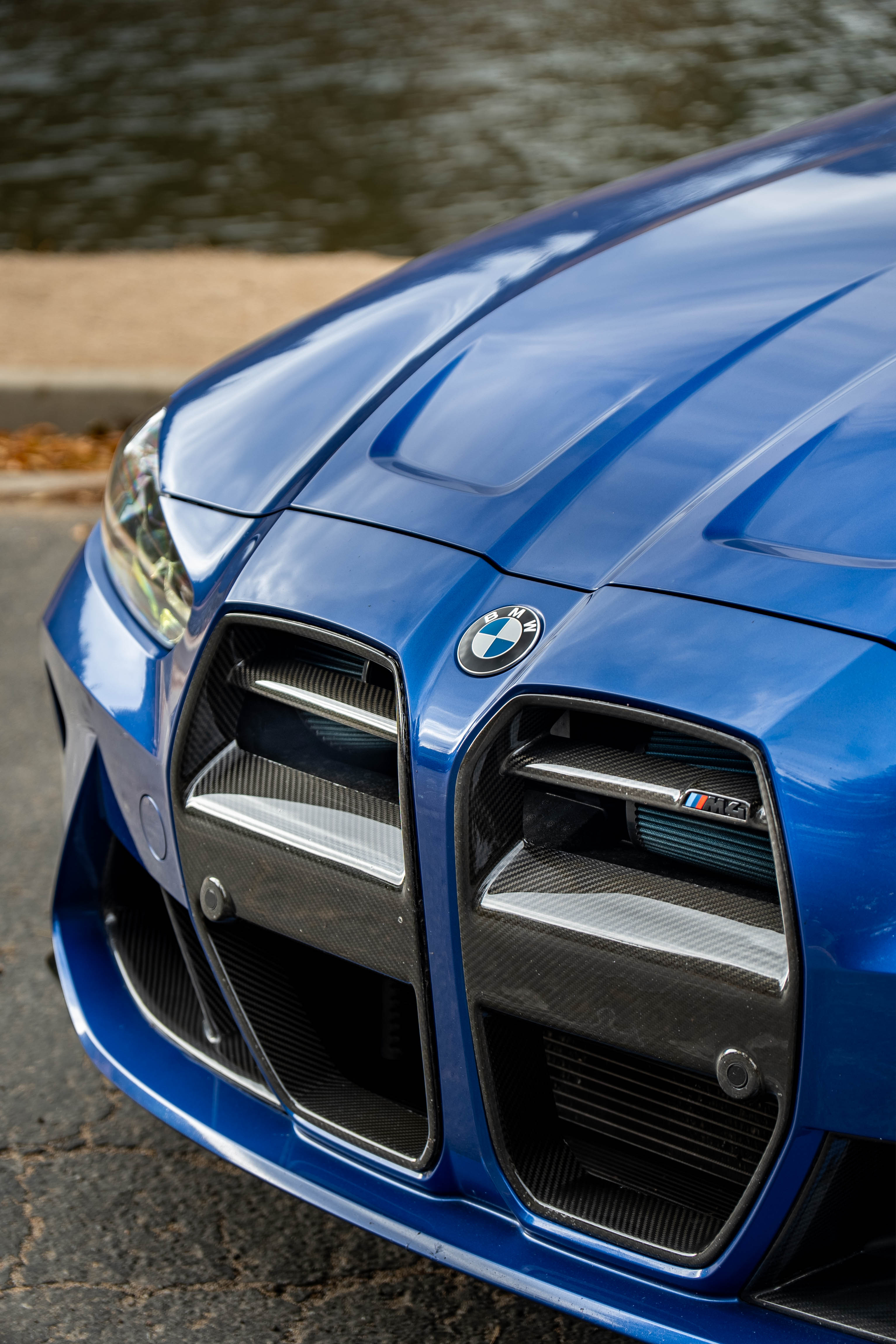 G82 BMW M4 with Motivo Forged MB-E custom wheels in gloss polished clear finish front corner view