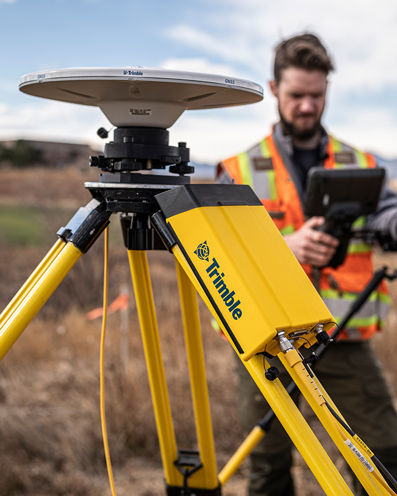 man using a Trimble R750