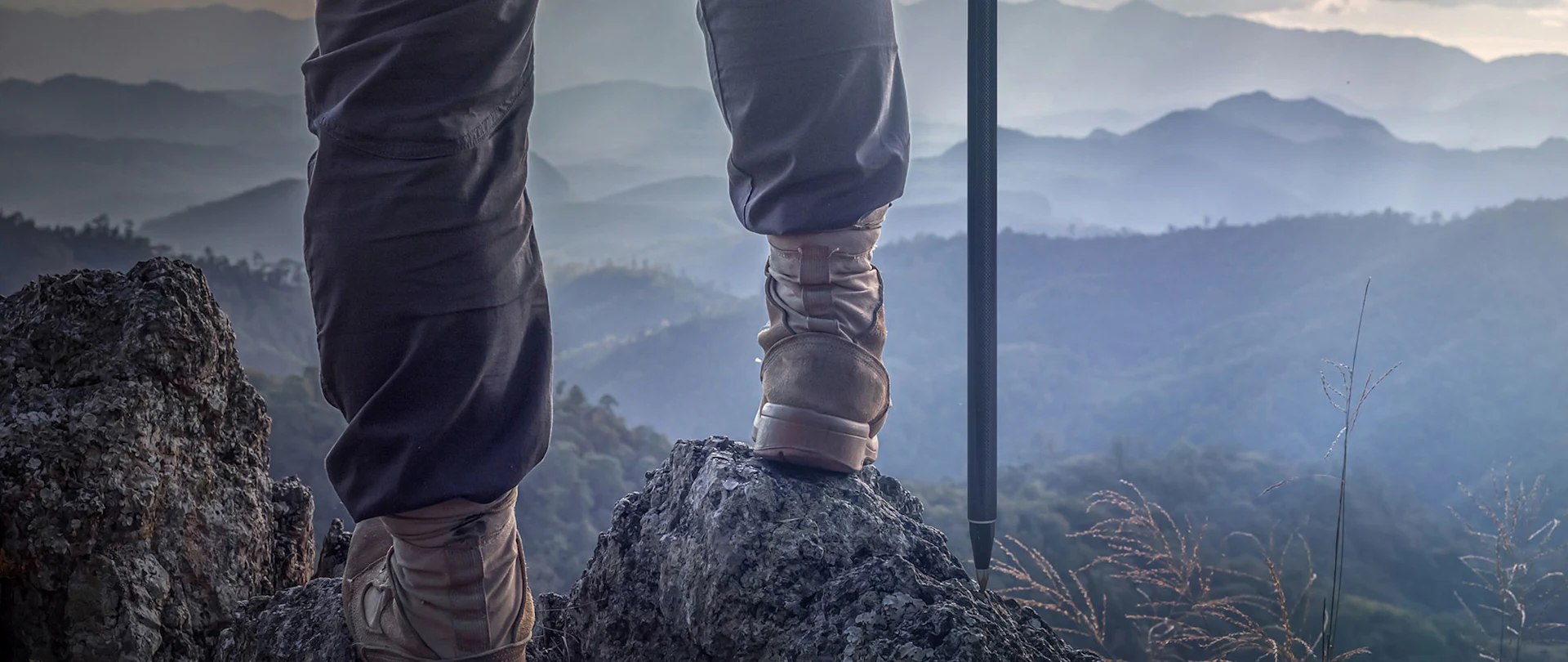 Surveyor on top of a mounatin