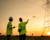 two men surveying with a uav