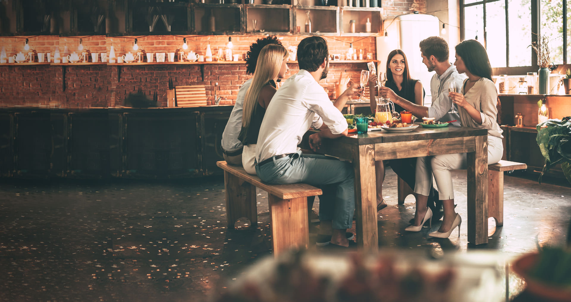 friends-eating-around-a-table i-screen